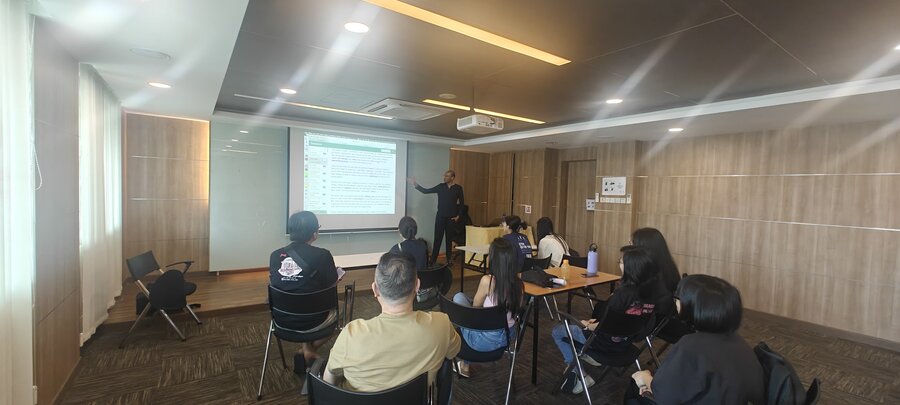 Yew Tee CC YouthThink session – wide view of classroom with EssayAce.AI on screen